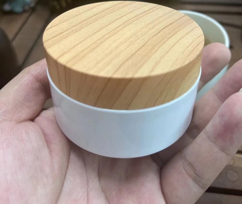 Het plastic Houten Bamboe van de de Roomkruik van de Korreldekking 100ml 200ml voor Kosmetische OEM